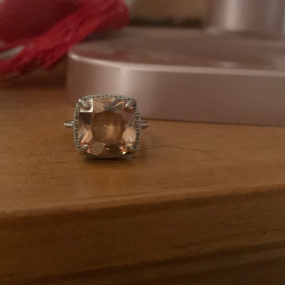 One bling ring 💍 available in purple and champagne colour gem stone marked 925